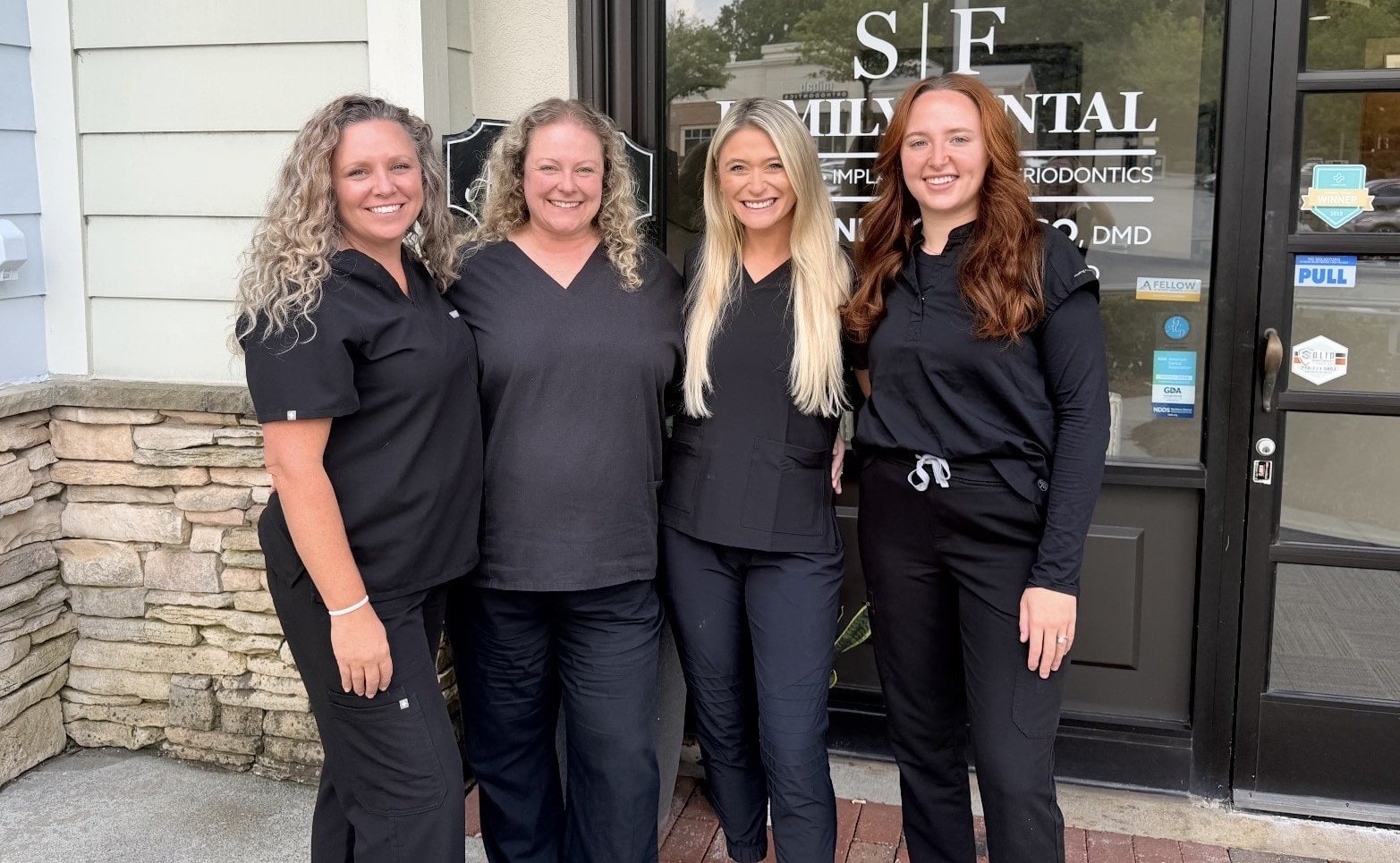 The S|F Family Dental team outside the Alpharetta office